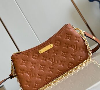 Liv Pochette Monogram Empreinte Leather Cognac Nano Bag